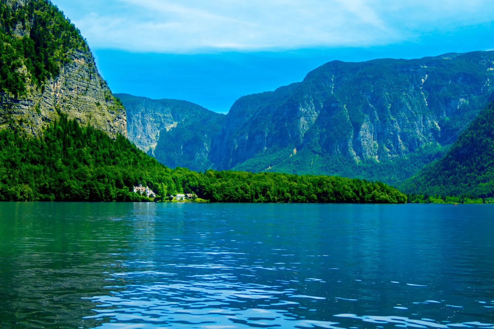 Mountain lake landscape near Hallstatt, Austria, with a small lakeside chapel